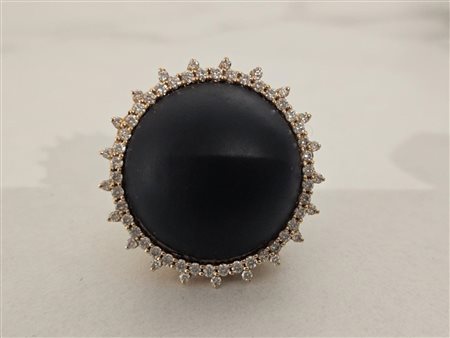 Anello con pietra nera e brillantini Oro 18kt e piccoli diamanti. 20.9 gr.