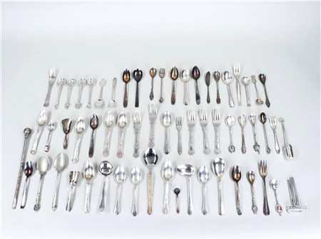 A collection of various 'silver plated' spoons and sprinklers.