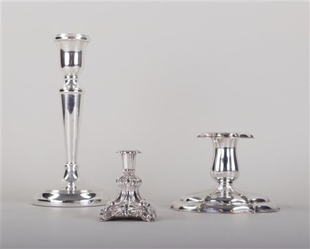 A lot consisting of (3) various silver candlesticks. Various sizes. The...