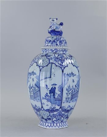 A 'Delft' lidded vase, with foo dog on the lid, and 'Chinese' representations...