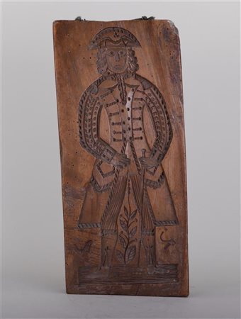 An 18th century speculaas board, front a female, back a male. 42 x 19 x 4.5 cm.