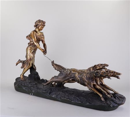 A gold-painted plaster group of a hunting goddess with greyhounds. Annotated...