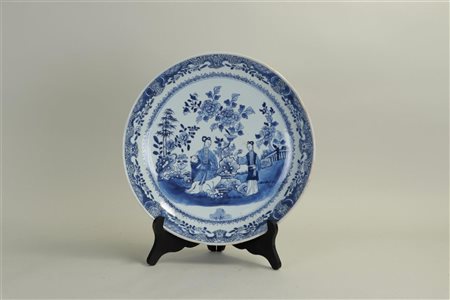 A Chinese dish with a representation of court ladies in a garden, China 18th...