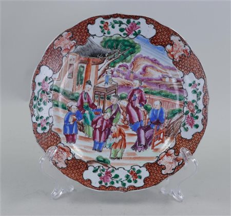 A porcelain Manderin plate decorated with various figures. China, 18th...