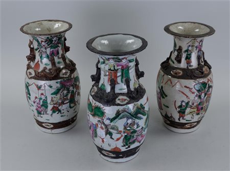 A lot consisting of (3) Chinese so-called 'Nanking vases with representation...