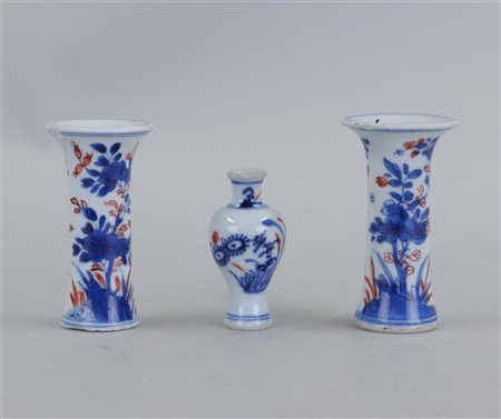 Two porcelain Imari beaker vases and an Imari etagère vase. China, 18th...
