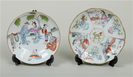 A set of two famile rose plates with decoration of various figures, marked on...
