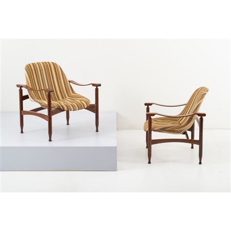 BUSNELLI, Coppia poltrone modello “Tiki Arm”