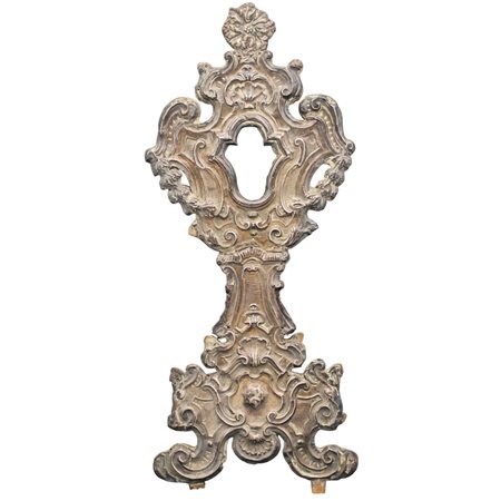 Ostensorio Antico argento inciso e sbalzato a motivi ornamentali, floreali e...