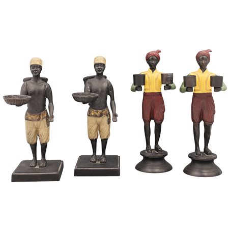 Quattro piccoli mori Statuette in bronzo. Secolo XX. Cm h 27