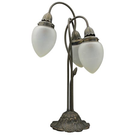 Lampada da tavolo Bronzo decorato alla base a motivi vegetali e floreali....