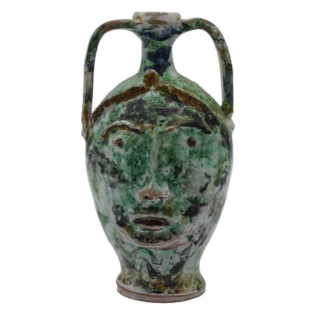 Grande fiasca antropomorfa Maiolica policroma. Caltagirone. Secolo XX. Cm h 29,5
