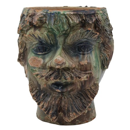 Testa di moro Cachepot in maiolica decorata a motivi ornamentali policromi....