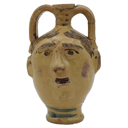 Fiasca antropomorfa Maiolica con decoro ornamentale policromo (danni)....