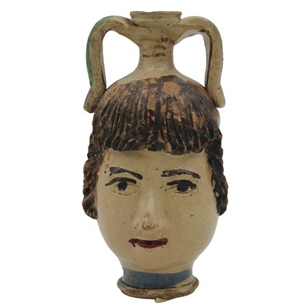 Fiasca antropomorfa Antica maiolica decorata a motivi ornamentali policromi...