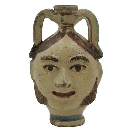 Fiasca antropomorfa Antica maiolica decorata a motivi ornamentali policromi...