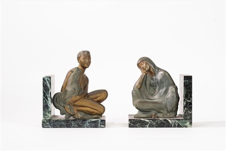 Coppia di fermalibri con figure allegoriche della Notte e del Giorno