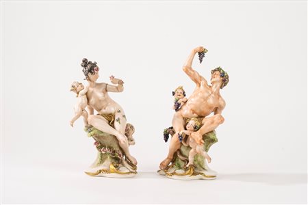 Coppia di sculture in porcellana policroma,  raffiguranti Bacco e Flora, secolo XX