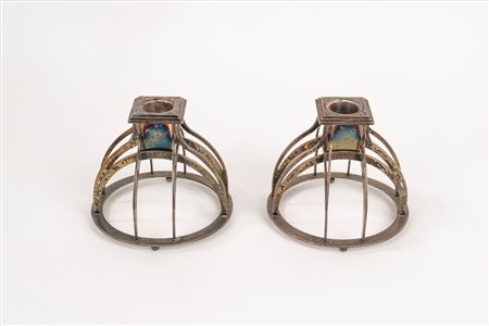 Coppia di candelieri in metallo argentato, Alessi