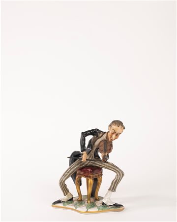 Scultura in porcellana policroma raffigurante violinista, fine secolo XIX-inizi secolo XX