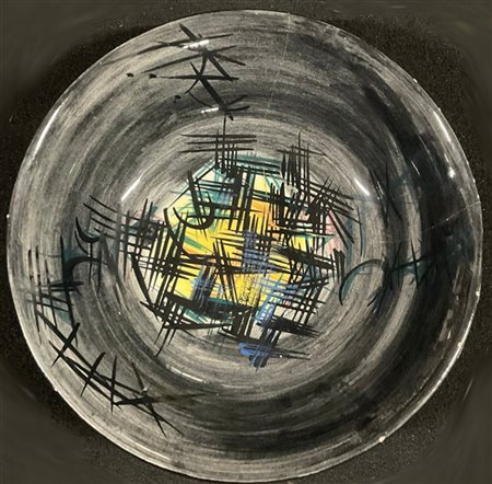 Sergio Dangelo "Senza titolo" 1954
ceramica dipinta e smaltata
d cm 24,5, h cm 6