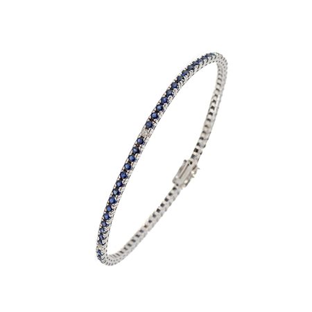 TENNIS in oro bianco 18 KT con brillanti e zaffiri