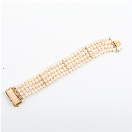 BRACCIALE a 4 fili di corallo rosa con susta oro giallo 18 KT