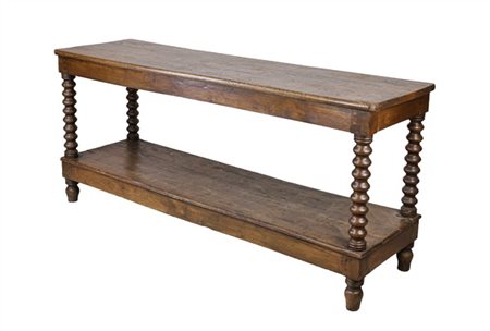 Tavolo da lavoro da centro in noce con gambe tornite riunite da pianetto. Secol