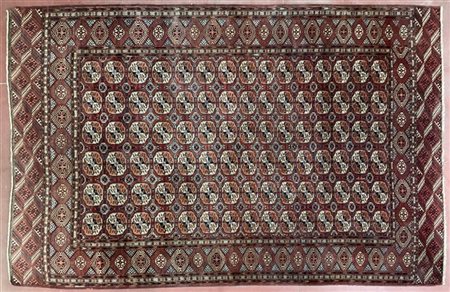 Tappeto Boukhara, Turkestan occidentale, inizio secolo XX. Decoro con sei file