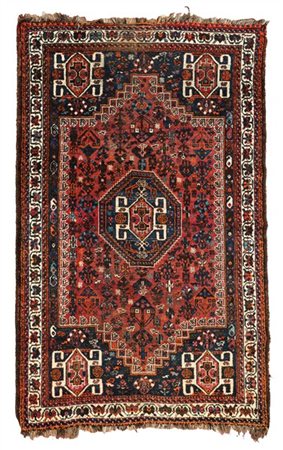 Tappeto Shiraz, Persia, secolo XX. Decoro con medaglione ottagonale su campo ro