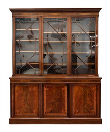 Libreria a due corpi impiallacciata in mogano e filettata in legno chiaro. Part