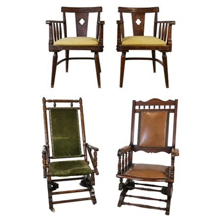 Lotto composto da quattro diverse poltrone delle quali una coppia in rovere con