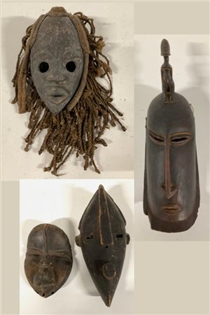 Arte Africana. Lotto composto da quattro maschere (h. max cm 46) (difetti)