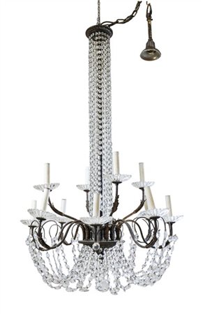 *Lampadario in metallo a dodici luci su doppio ordine, bracci sagomati con bobe