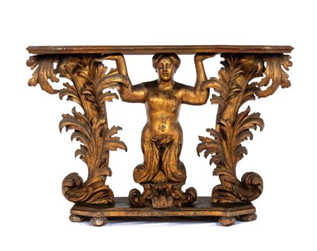  
Consolle Luigi XVI italiana in legno dorato  XVIII secolo
  Altezza x lunghezza x profondità: 86 x 132 x 40 cm.