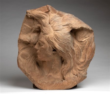 ARRIGO MINERBI 
Ferrara, 1881 - Padova, 1960 (attribuito a)  
Terracotta con volto di saffo Italia, XX secolo
 Altezza x lunghezza x profondità:  51 x 48 x 15 cm