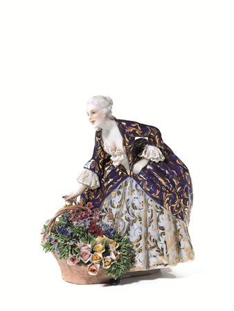 DAMA CON CESTO DI FIORIManifattura Fabris, Bassano-Milanoceramica policroma,...