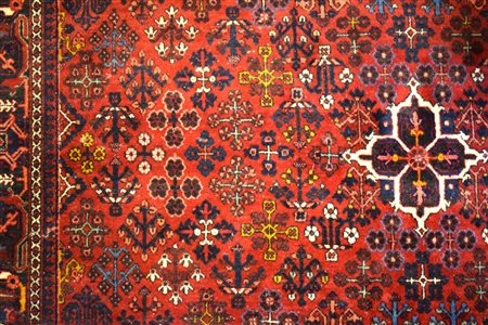 Tappeto persiano campo a motivi geometrici nei toni del porpora cm 367x275...