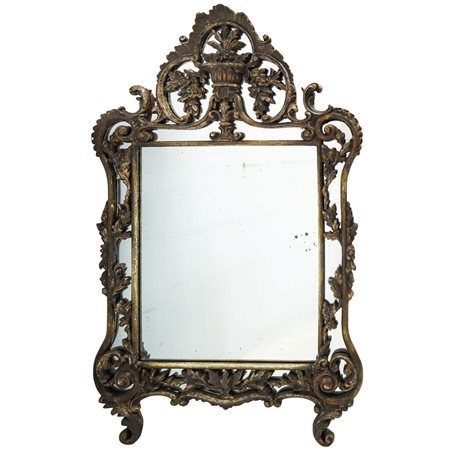 Specchio in cornice intagliata a motivi floreali, fine 19° secolo