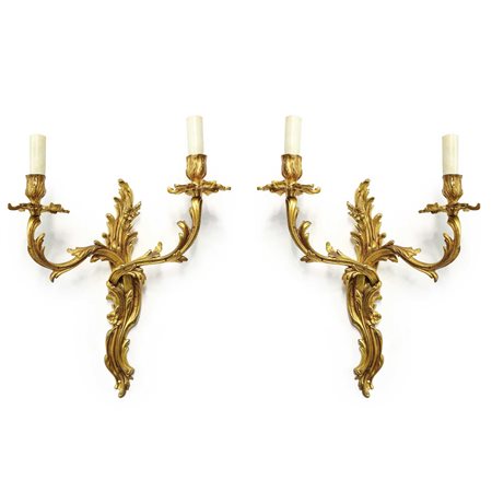 Coppia di appliques in metallo dorato dorato