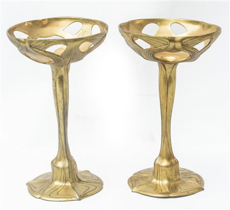  
ORIVIT - Coppia di portacandela primo quarto del XX secolo
bronzo 18 x 11 cm