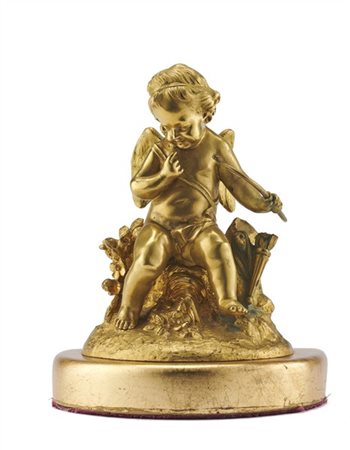 Arte del secolo XIX. Amorino in bronzo dorato su zolla fiorita, base adattata i