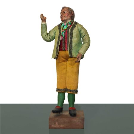 Personaggio presepiale in terracotta e legno con vesti in cotone, raso e passamaneria:uomo calvo con  giubbotto color cammello, Naples 19° secolo