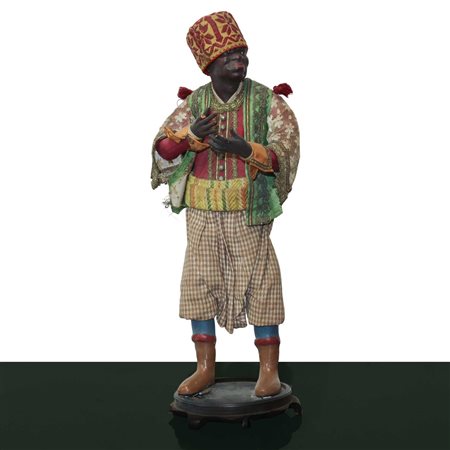 Personaggio presepiale in terracotta e legno con vesti in cotone, raso e passamaneria: servitore moro, Naples 19° secolo