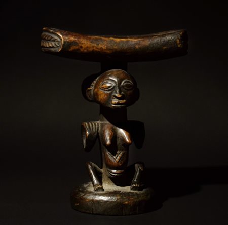 An African caryatid head rest