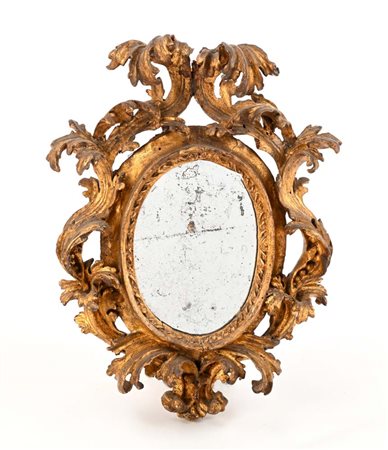 Piccola cornice in legno scolpito e dorato, XVIII secolo luce ovale...