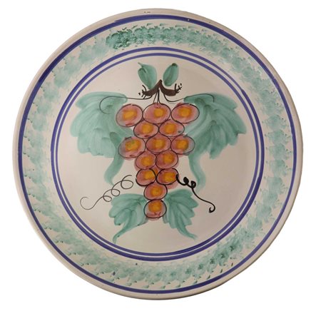 Grande piatto decorativo in ceramica di Caltagirone raffigurante uva