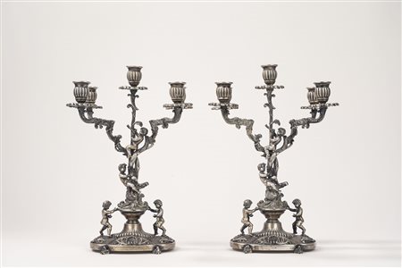Coppia di candelabri con putti , Italy, 20th century
