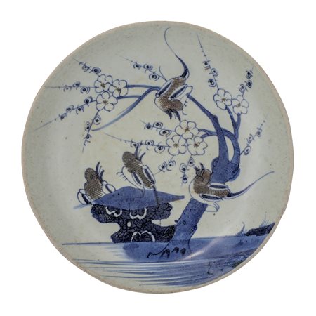 Cina. XX secolo
Piatto con decoro di uccelli e susino