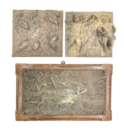 Lotto composto da tre rilievi in bronzo di cui una coppia con scene bacchiche (
